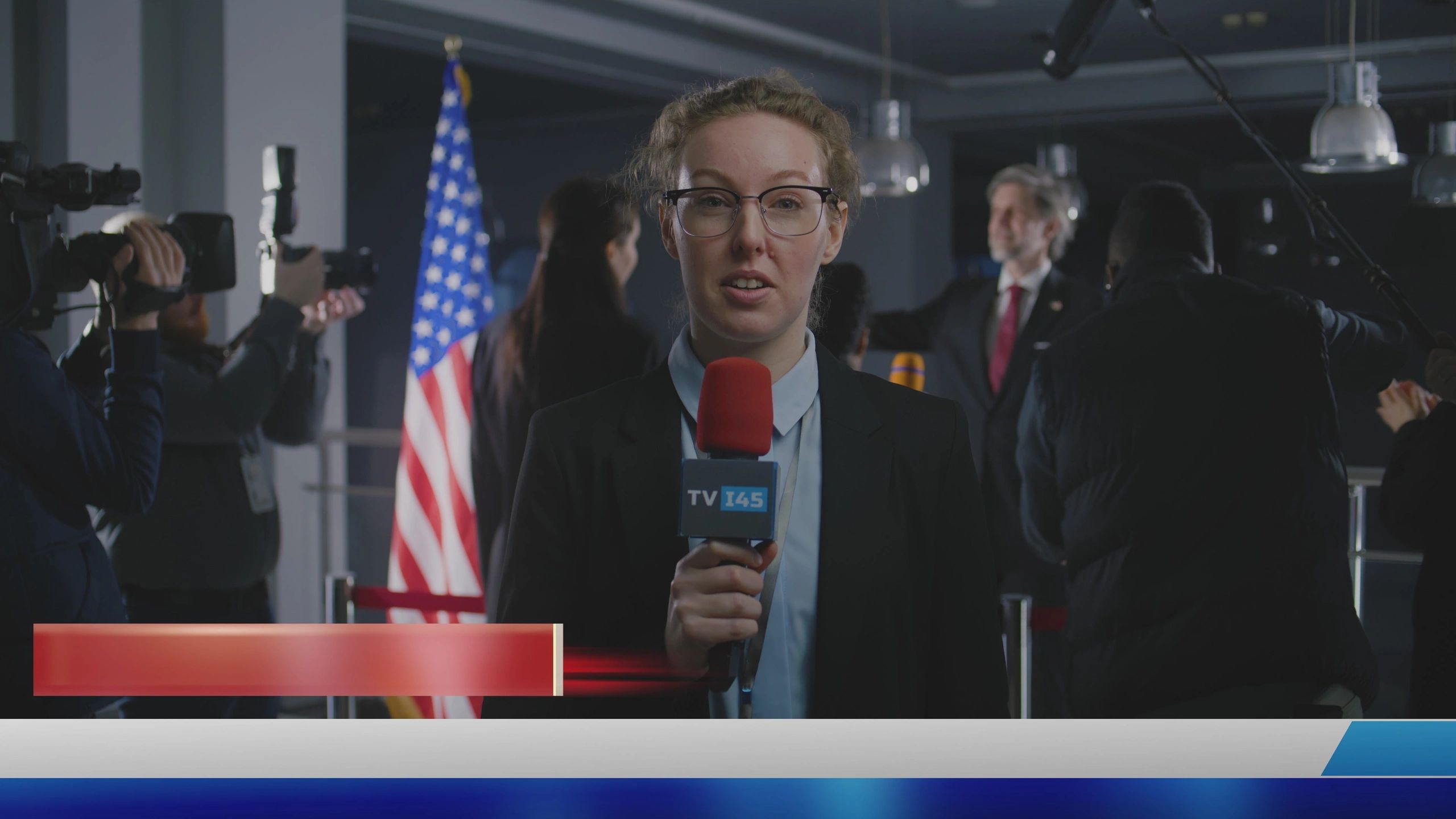 Broadcast presenter in a newsroom setting